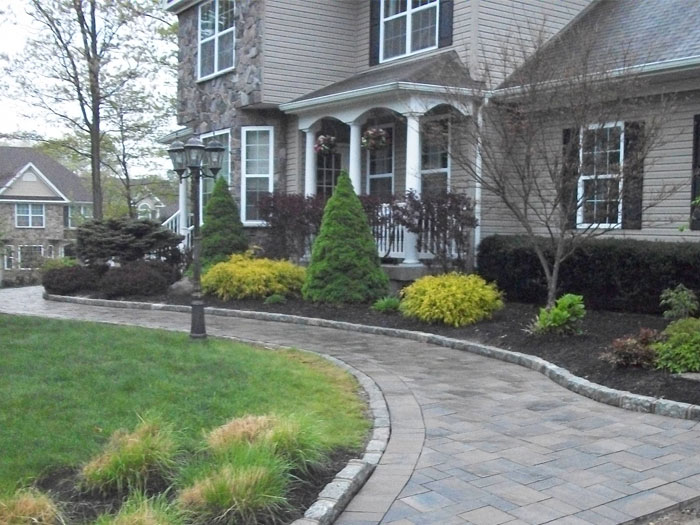 Hamptons East End Long Island Mason Design, Custom Walkway with Raised and Recessed Cobblestone Walkay Edging
